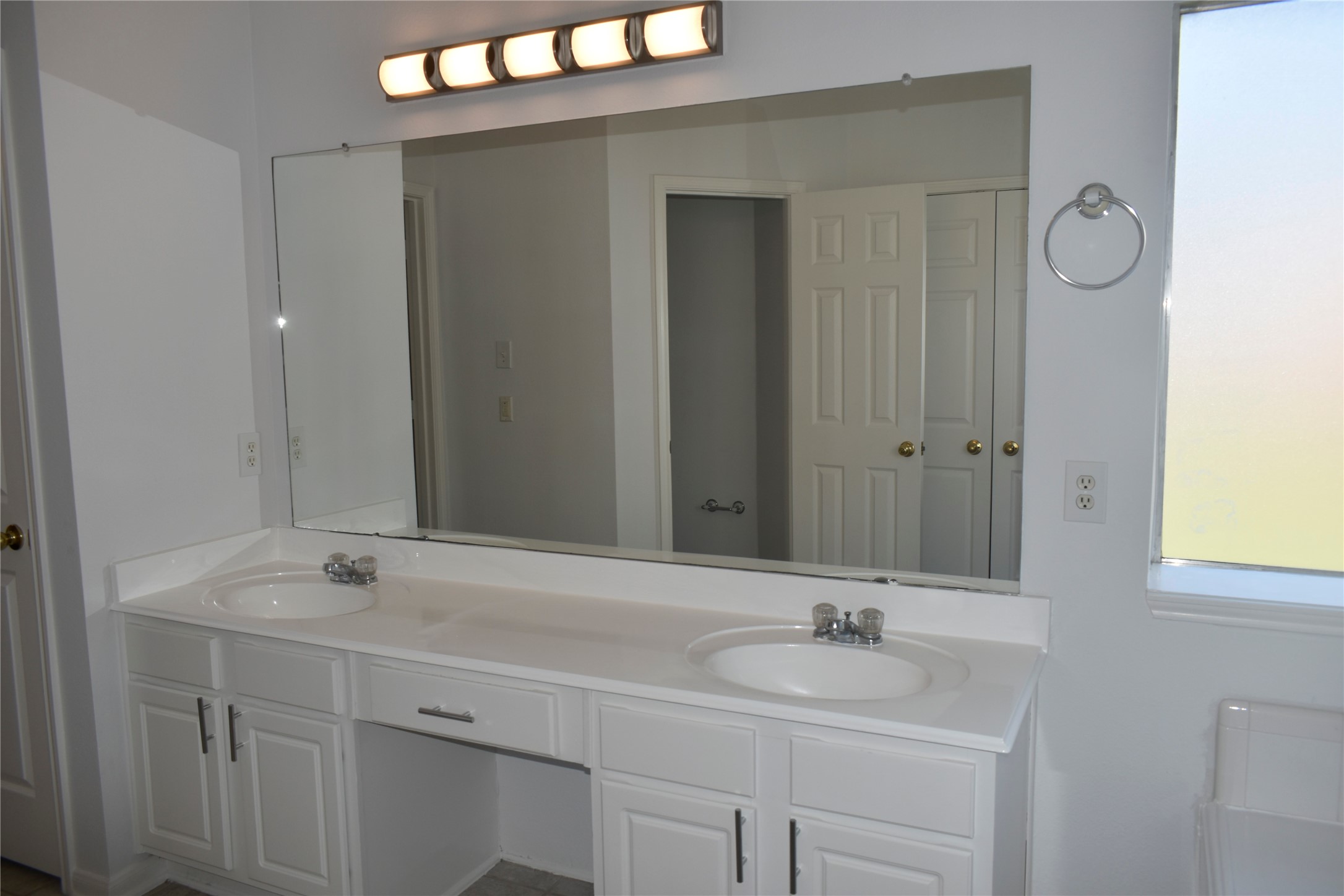 507 Springhope Court Houston, TX 77049 - Photo 14 of 18 a bathroom with a sink and a mirror