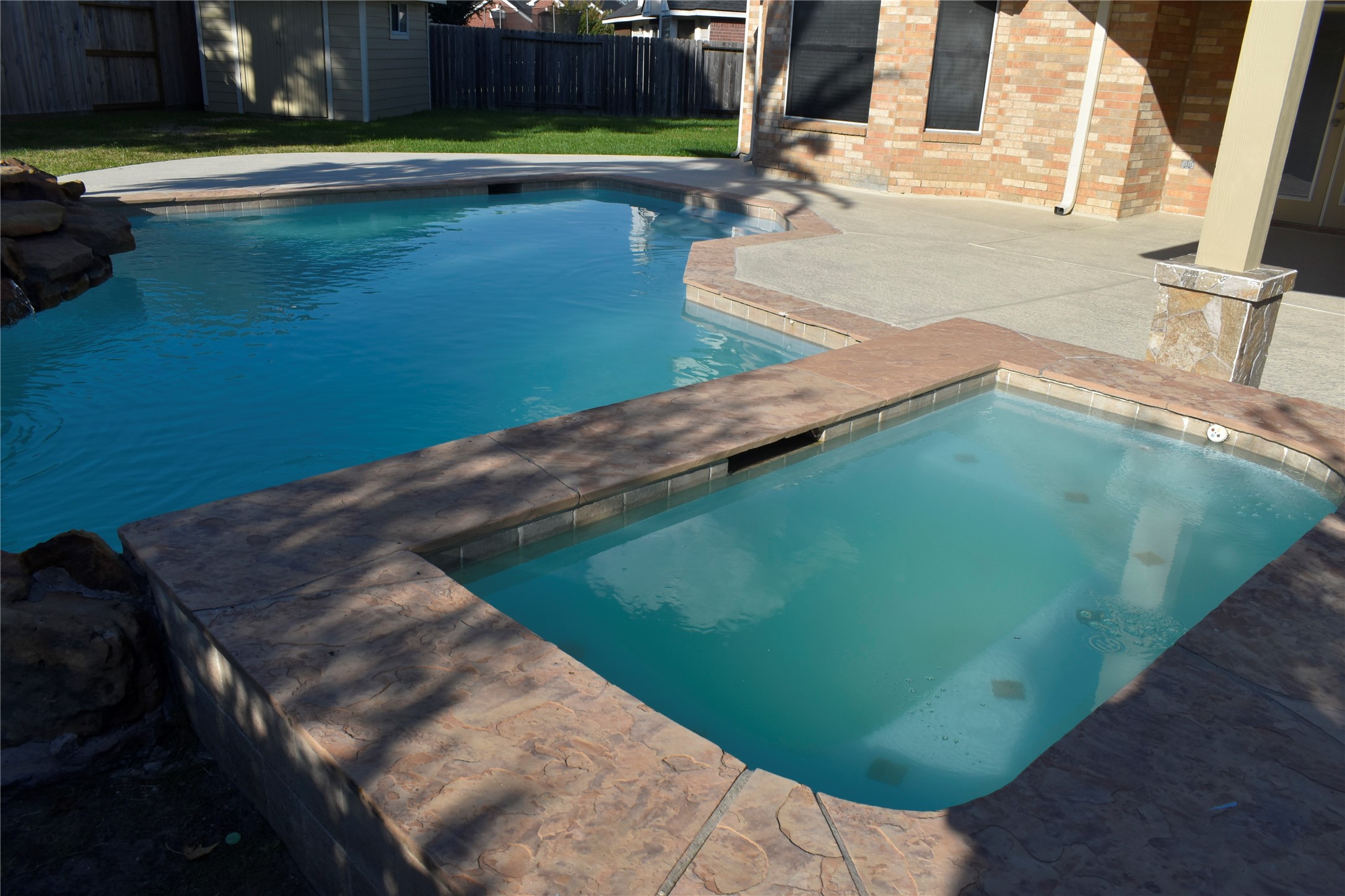 507 Springhope Court Houston, TX 77049 - Photo 16 of 18 a view of a swimming pool