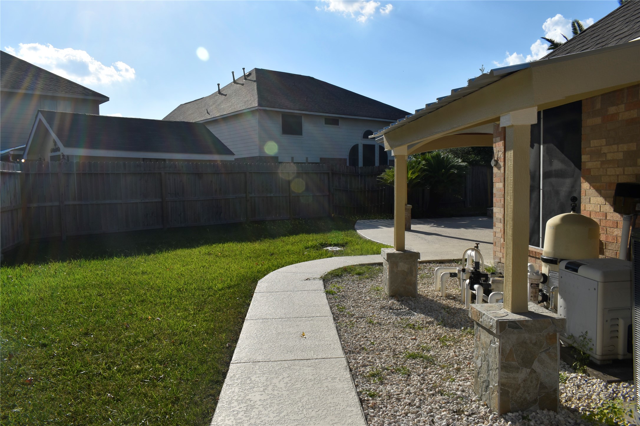 507 Springhope Court Houston, TX 77049 - Photo 18 of 18 a backyard of a house with table and chairs
