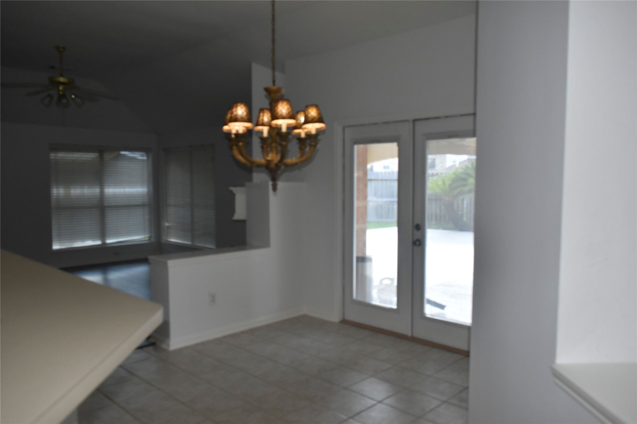 507 Springhope Court Houston, TX 77049 - Photo 6 of 18 a view of a room with a chandelier