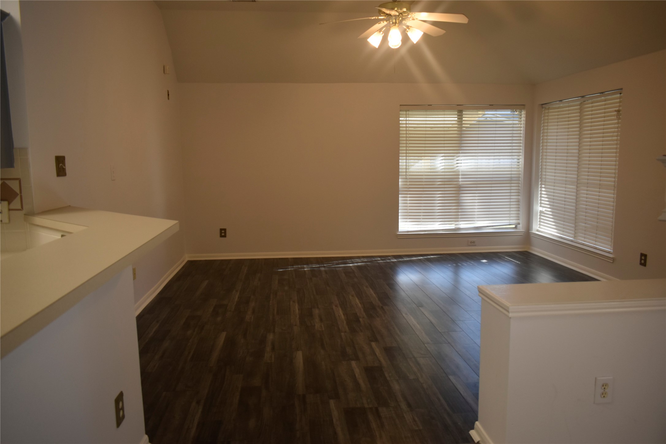507 Springhope Court Houston, TX 77049 - Photo 7 of 18 a view of empty room with wooden floor and fan