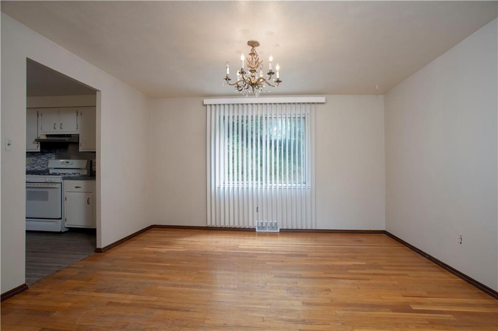 857 Blue Ridge Road Pittsburgh, PA 15239 - Photo 5 of 21 Formal dining room with hardwood flooring ...