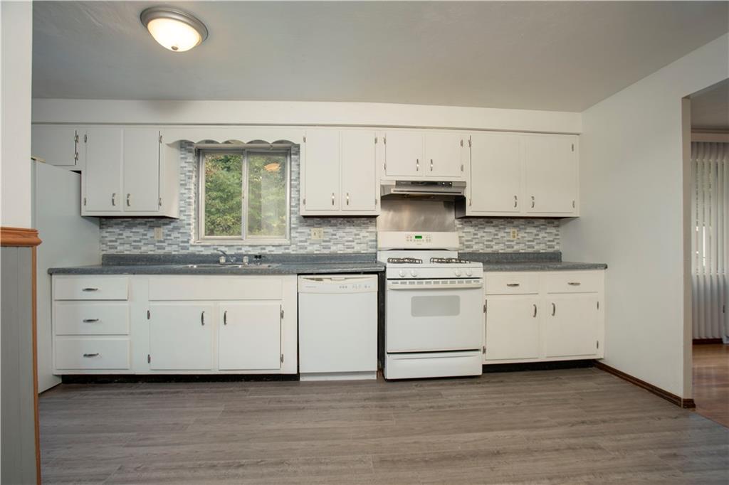 857 Blue Ridge Road Pittsburgh, PA 15239 - Photo 7 of 21 White cabinetry with backsplash ...