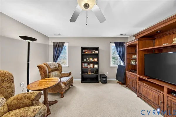 a bathroom with a sink double vanity and a mirror