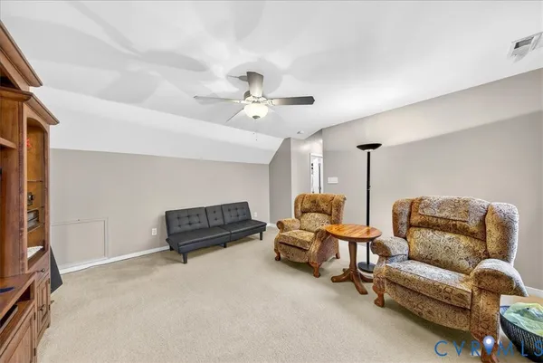 a view of a wooden chairs on the deck