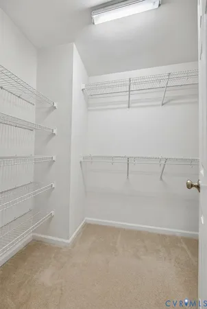 a view of a yard with basketball court