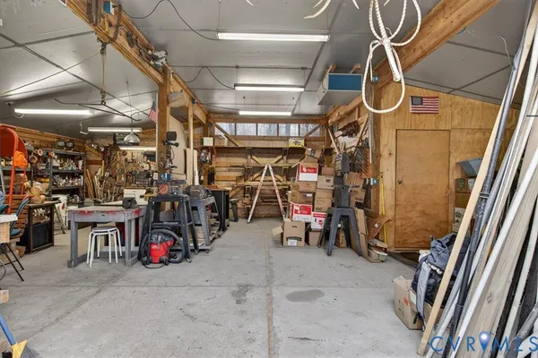 a backyard of a house with barbeque oven