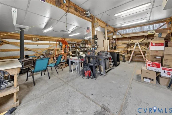 a view of a house with a yard and garage