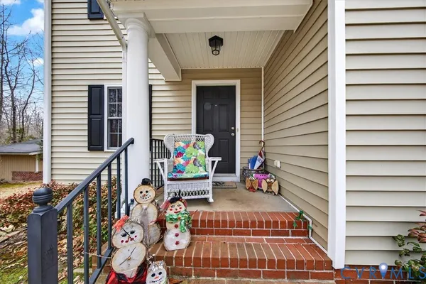 a bathroom with a toilet and a mirror