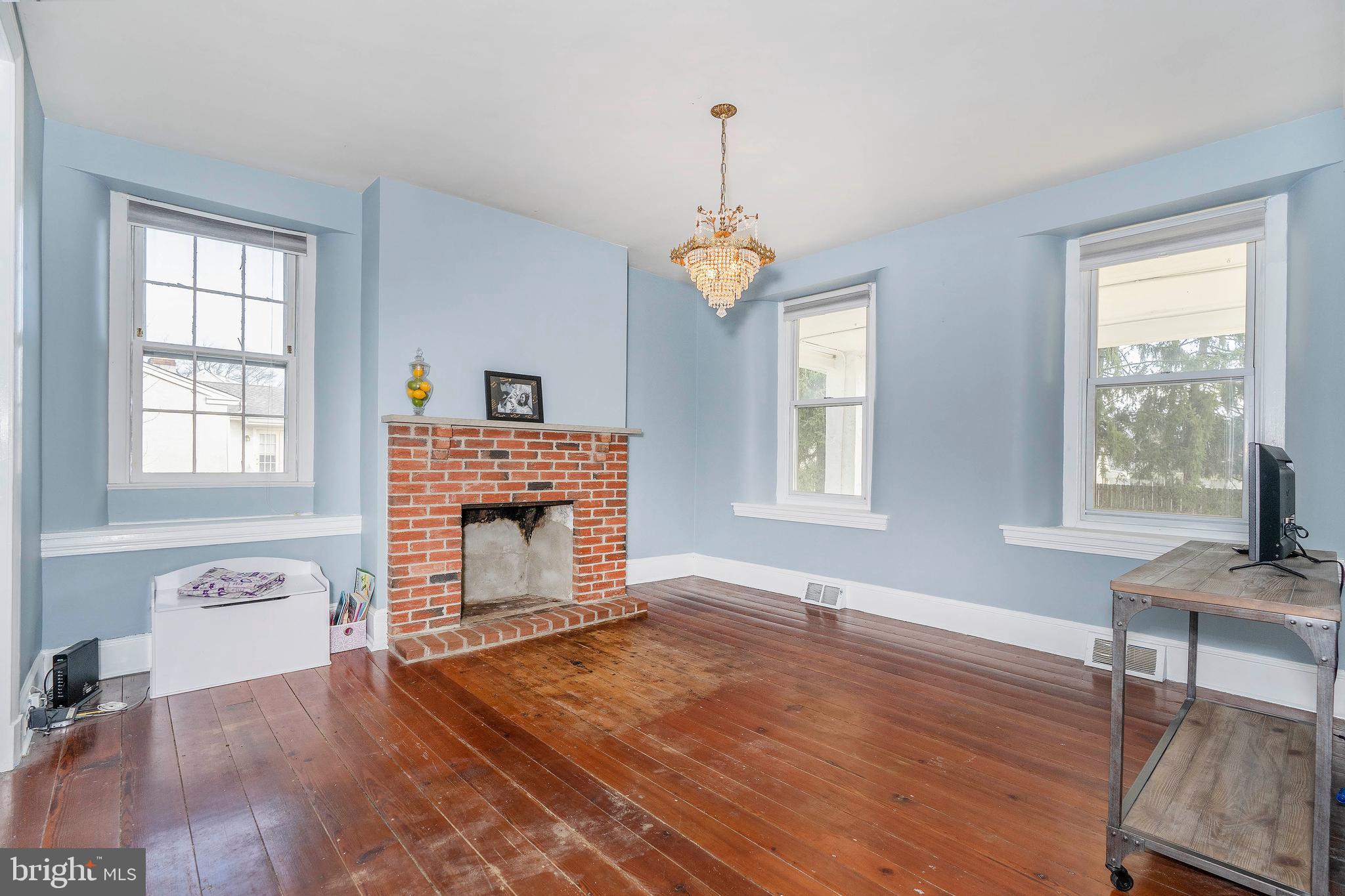 337 Ruth Avenue Aston, PA 19014 - Photo 7 of 31 Formal dining room with fireplace