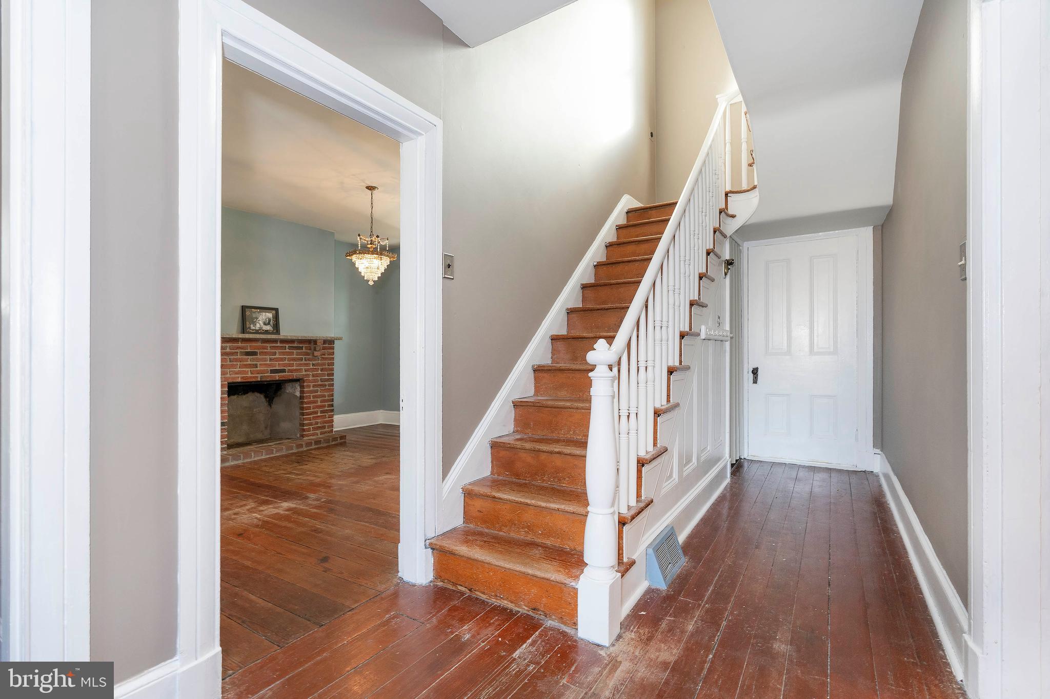 337 Ruth Avenue Aston, PA 19014 - Photo 10 of 31 Main turned staircase leading to 2nd floor