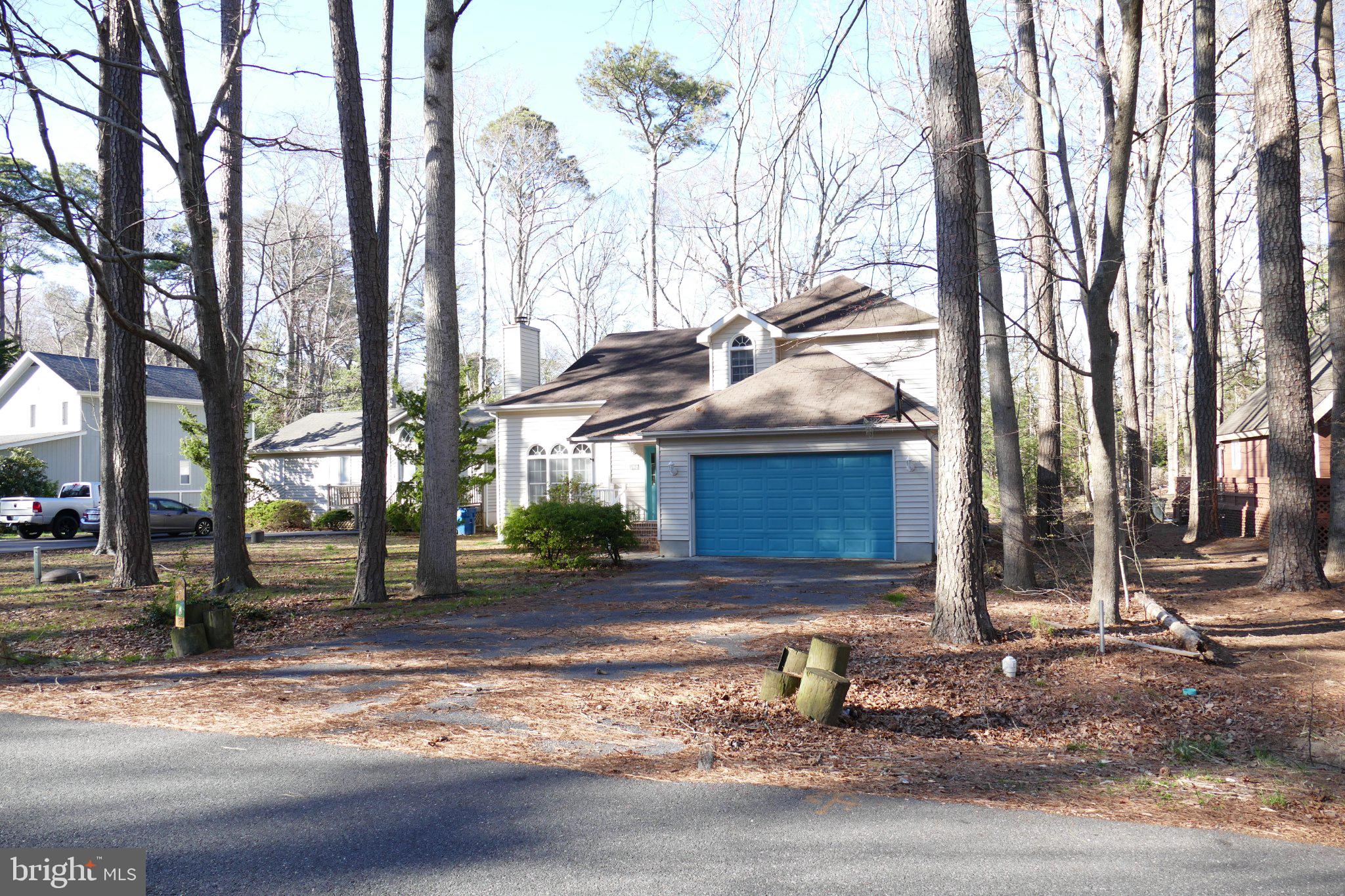 185 Windjammer Road Ocean Pines, MD 21811 - Photo 2 of 18 Charming home nestled among trees.