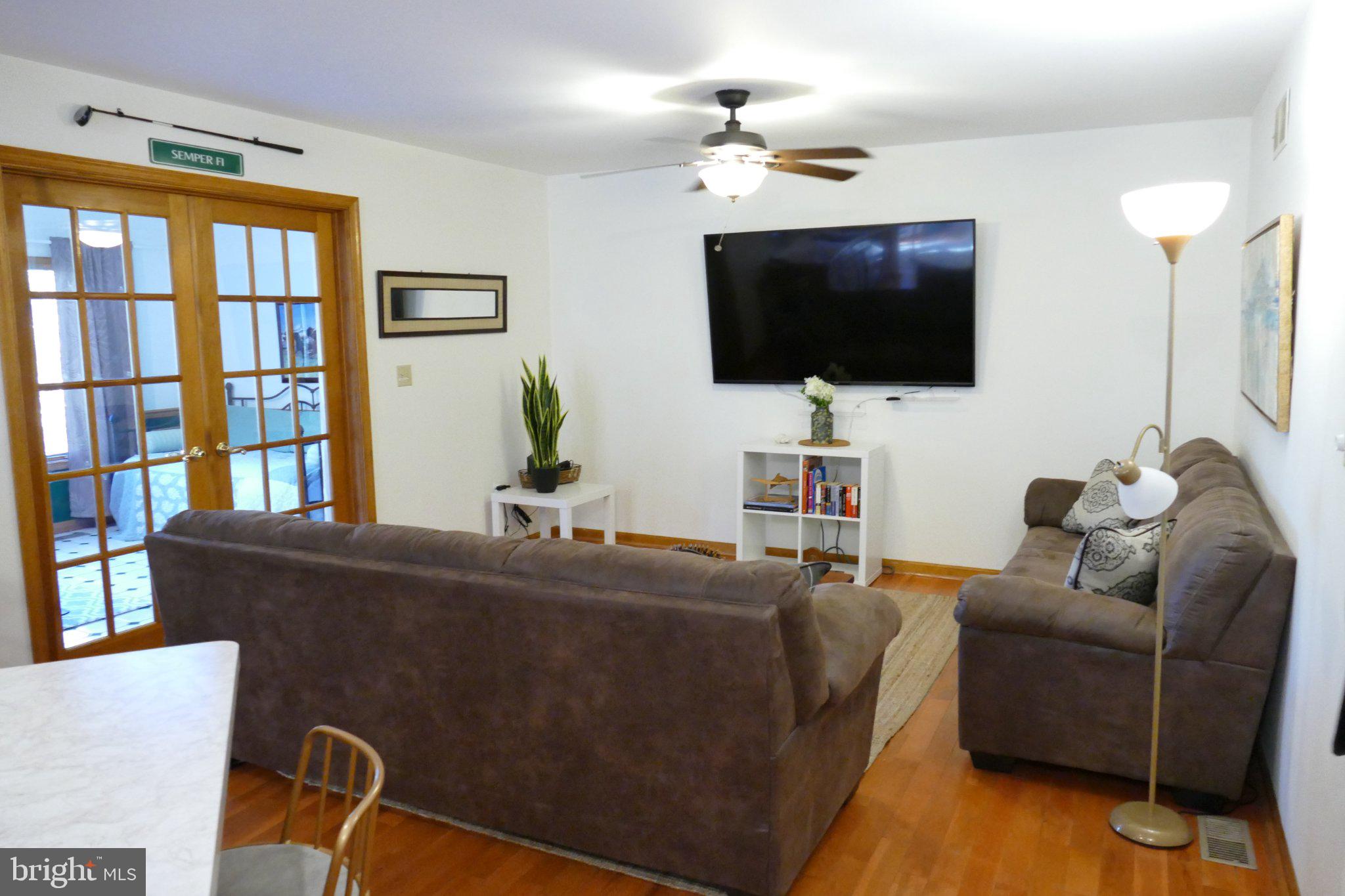 185 Windjammer Road Ocean Pines, MD 21811 - Photo 8 of 18 Cozy living space with natural light.