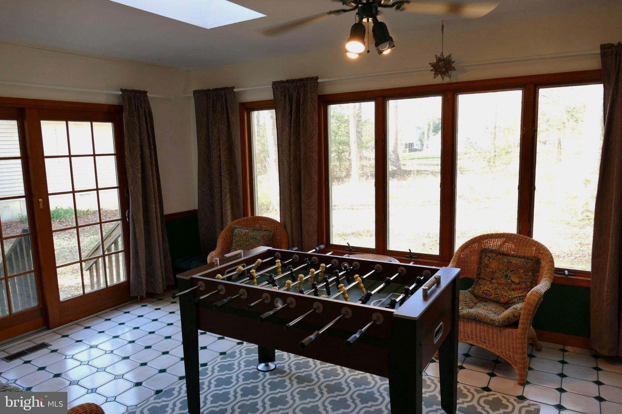 185 Windjammer Road Ocean Pines, MD 21811 - Photo 10 of 18 Bright game room with natural light.