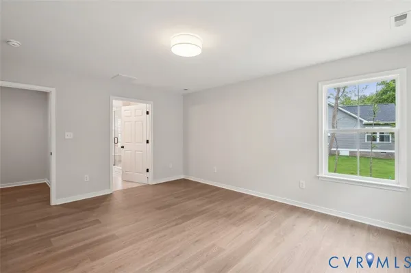 a front view of house with yard outdoor seating and green space