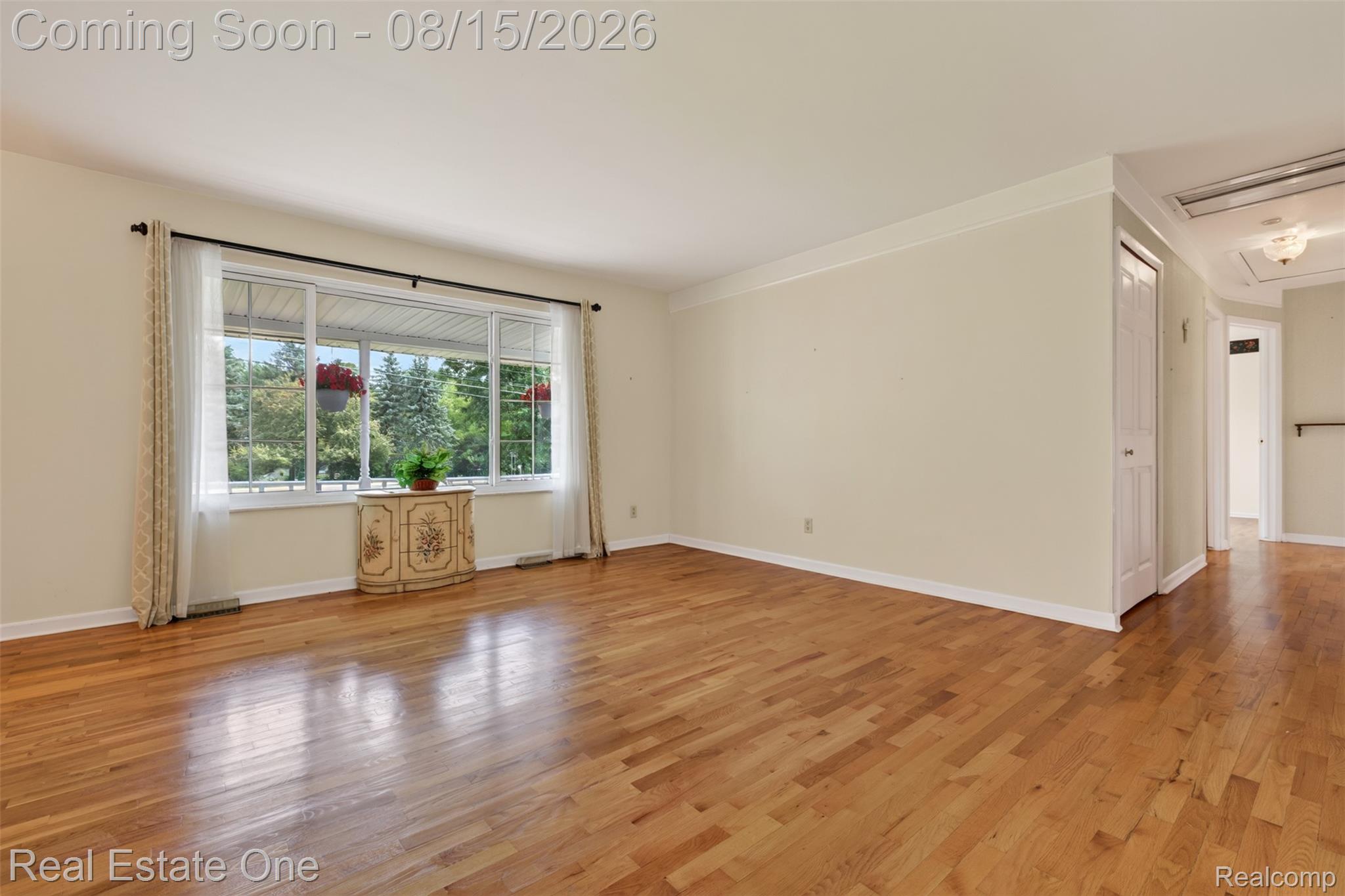 454 South Baldwin Road Oxford, MI 48371 - Photo 6 of 64 Hardwood flooring throughout with newer Wallside Windows.