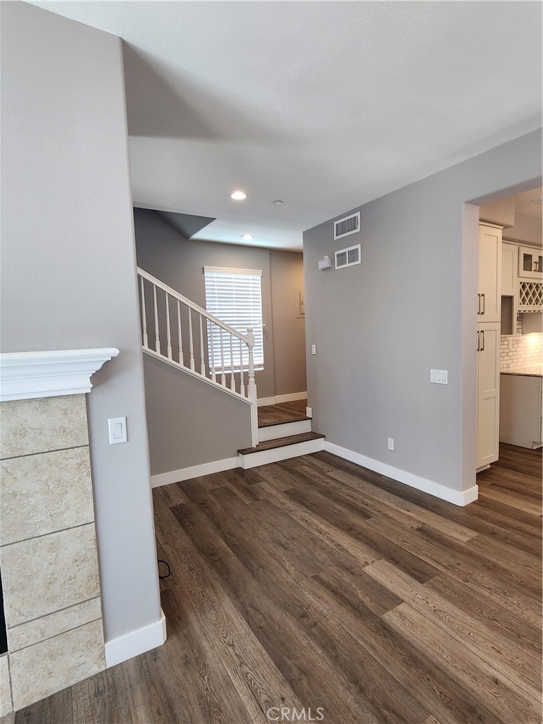 1 Arabis Way, Unit 59 Ladera Ranch, CA 92694 - Photo 14 of 32 a view of an empty room with stairs and a window