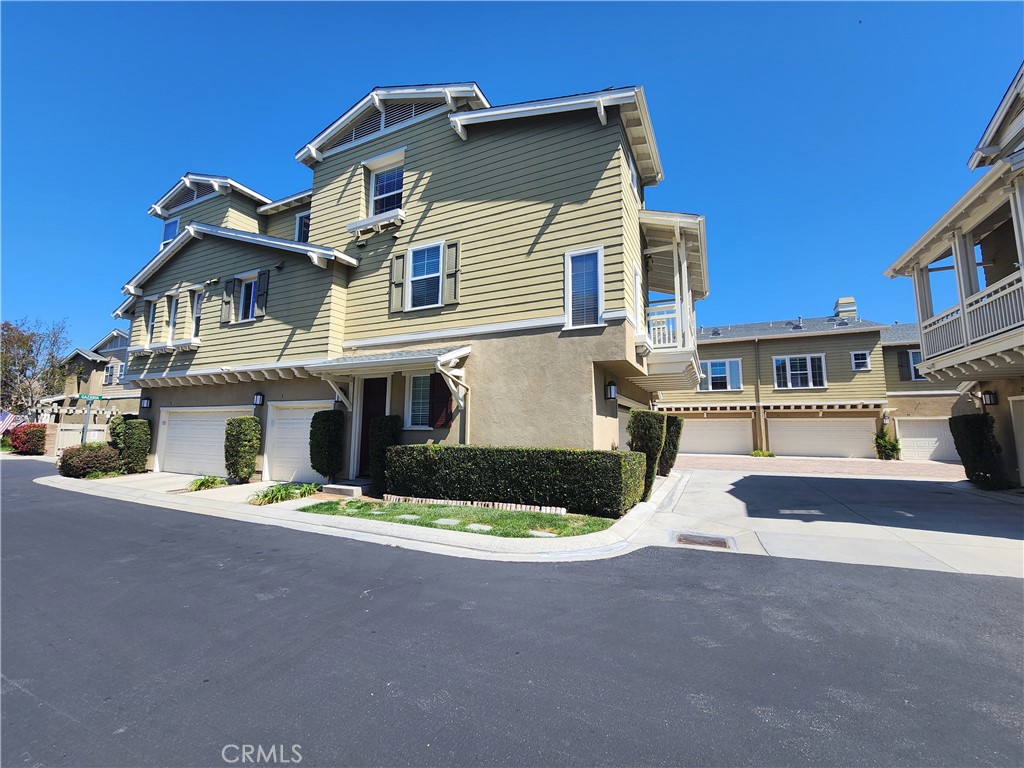 1 Arabis Way, Unit 59 Ladera Ranch, CA 92694 - Photo 2 of 32 a front view of a house with garden