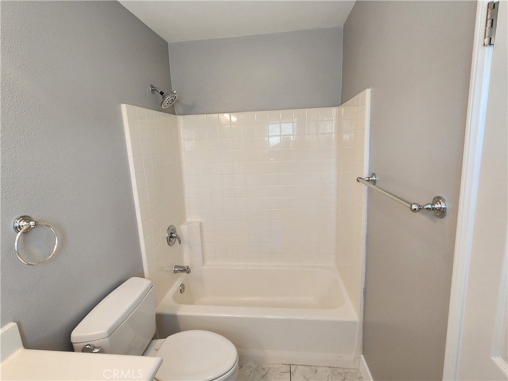 1 Arabis Way, Unit 59 Ladera Ranch, CA 92694 - Photo 23 of 32 a bathroom with a toilet and a shower