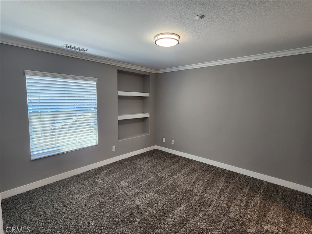 1 Arabis Way, Unit 59 Ladera Ranch, CA 92694 - Photo 25 of 32 a view of an empty room with a window