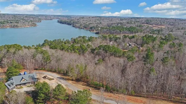 a view of a lake with a yard
