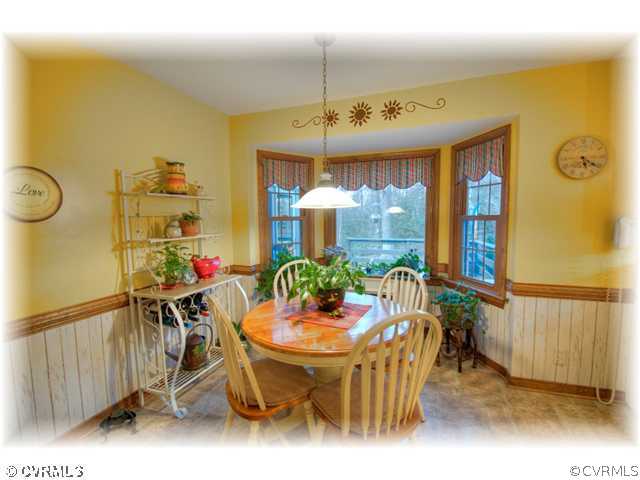 5106 Rock Harbour Road Midlothian, VA 23112 - Photo 5 of 12 a dining room with furniture and window