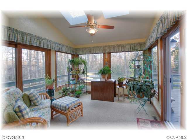 5106 Rock Harbour Road Midlothian, VA 23112 - Photo 6 of 12 a living room with furniture and a potted plant