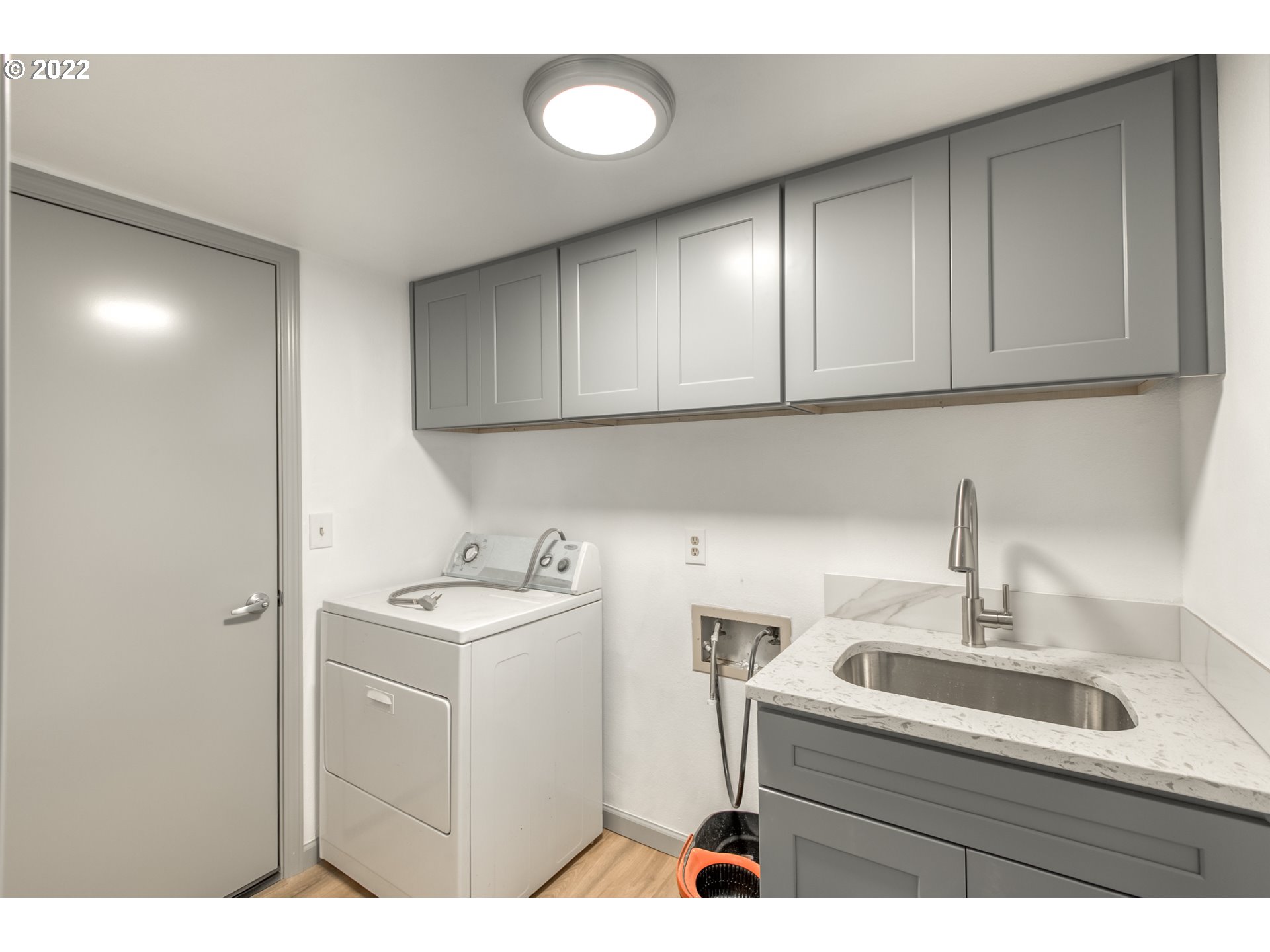 4435 Southeast Regner Road Gresham, OR 97080 - Photo 17 of 32 a utility room with sink dryer and washer