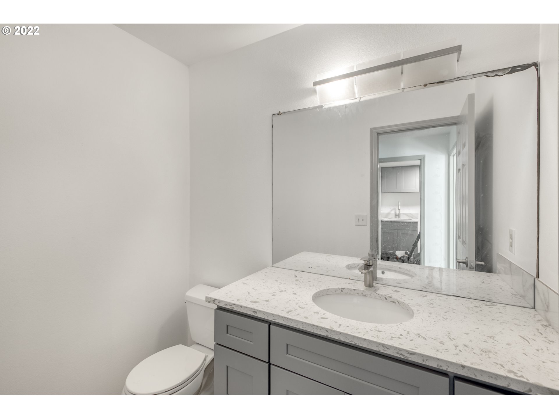 4435 Southeast Regner Road Gresham, OR 97080 - Photo 18 of 32 a bathroom with a sink and a mirror