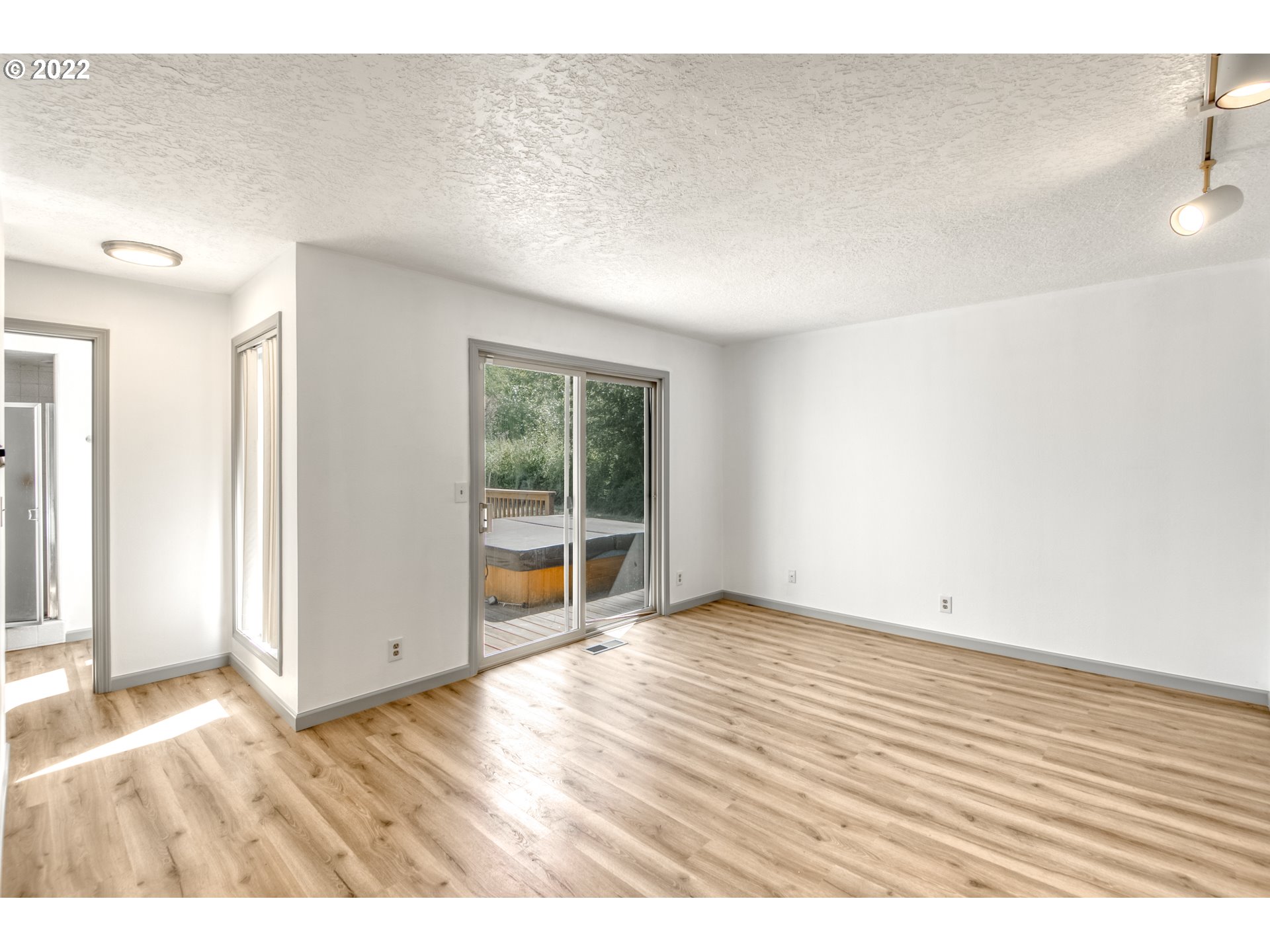 4435 Southeast Regner Road Gresham, OR 97080 - Photo 19 of 32 a view of an empty room with a window