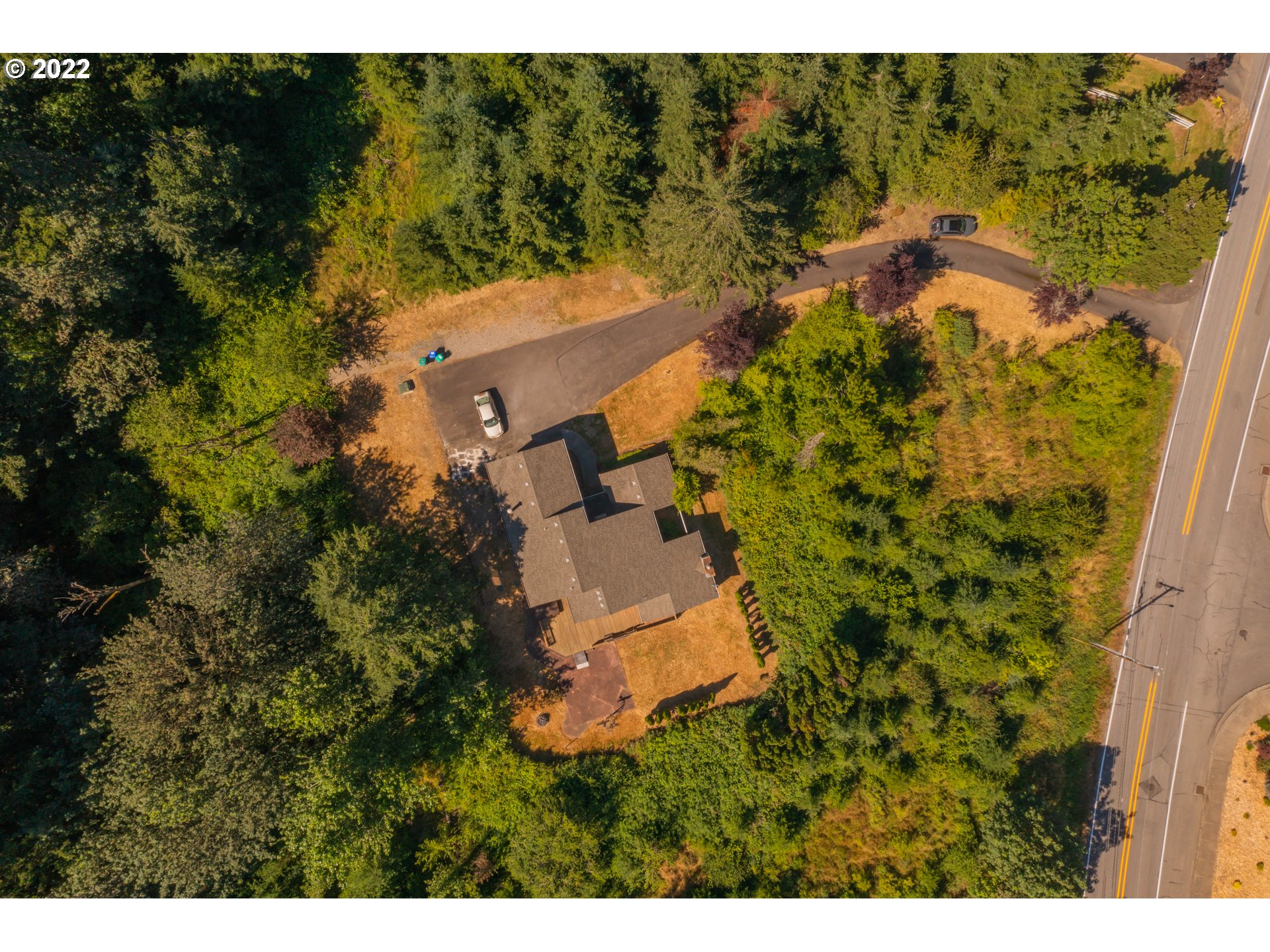 4435 Southeast Regner Road Gresham, OR 97080 - Photo 2 of 32 a view of a house with a yard