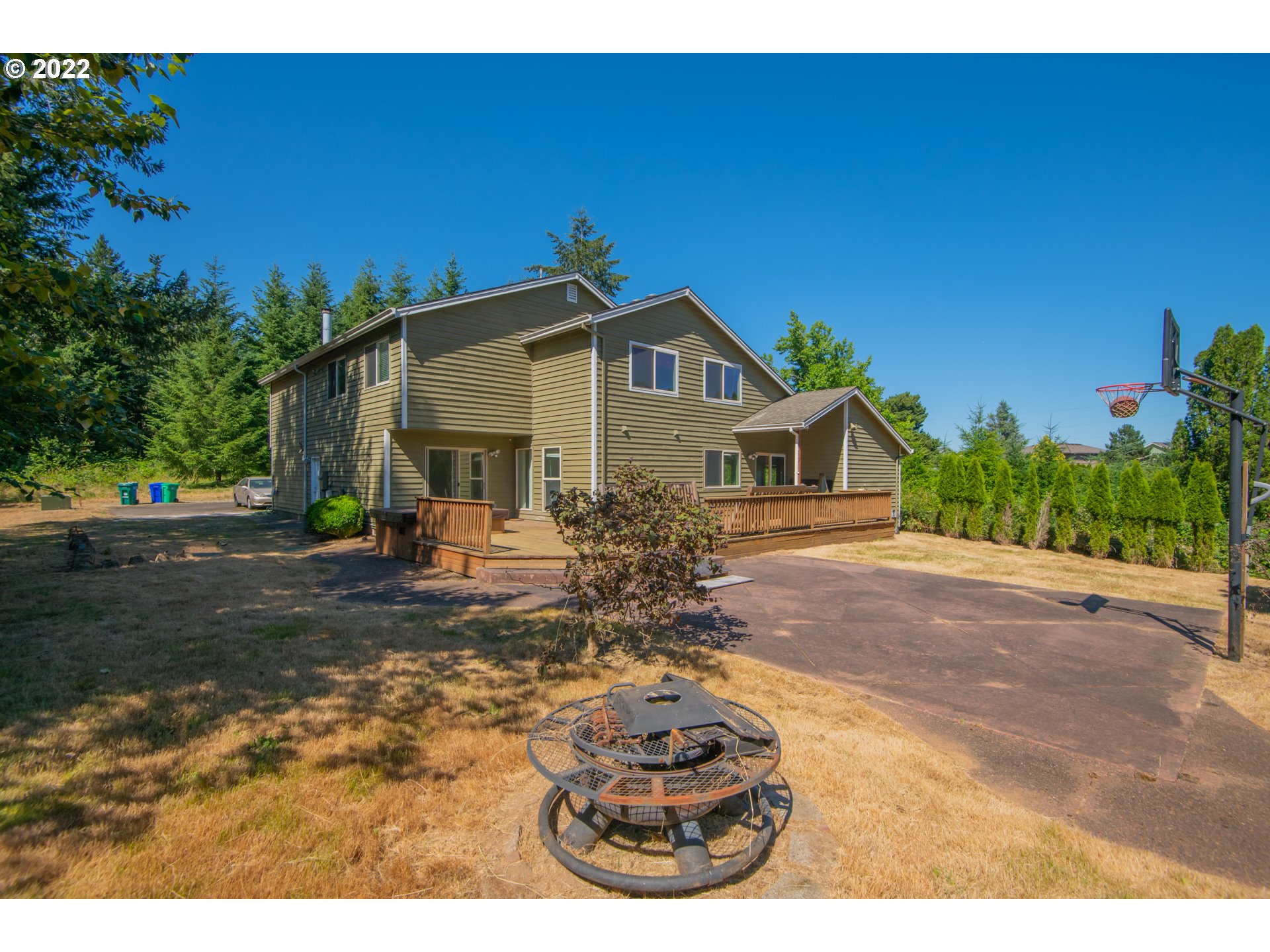 4435 Southeast Regner Road Gresham, OR 97080 - Photo 3 of 32 a front view of a house with a yard