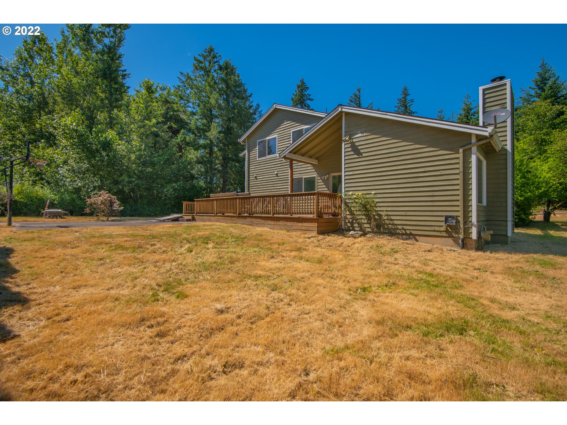 4435 Southeast Regner Road Gresham, OR 97080 - Photo 4 of 32 a house view with a backyard space