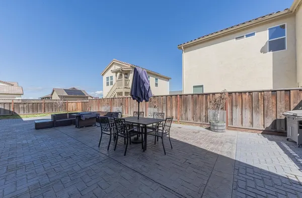 a view of a terrace with furniture