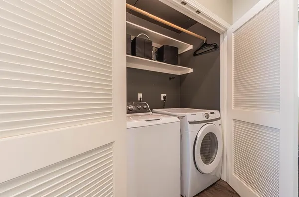 a utility room with dryer and washer