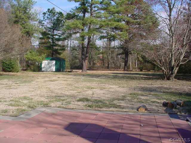 5207 Coxson Road Sandston, VA 23150 - Photo 2 of 5 a view of outdoor space with trees
