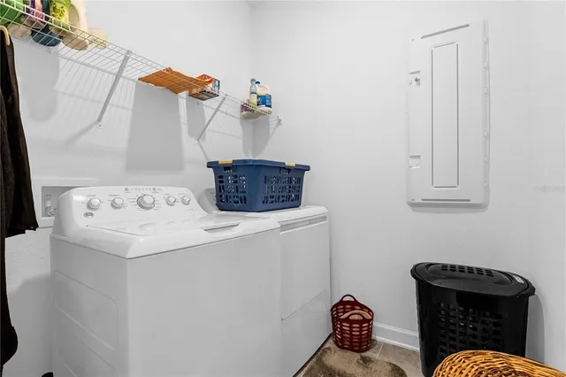 a utility room with dryer and washer