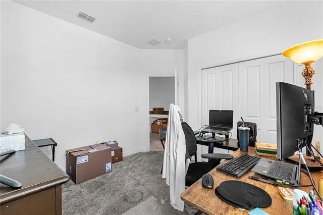 a room with furniture and a flat screen tv