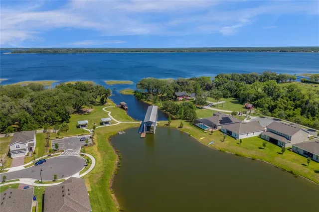 swimming pool view with a garden space