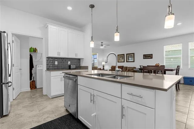 a kitchen with counter top space and appliances