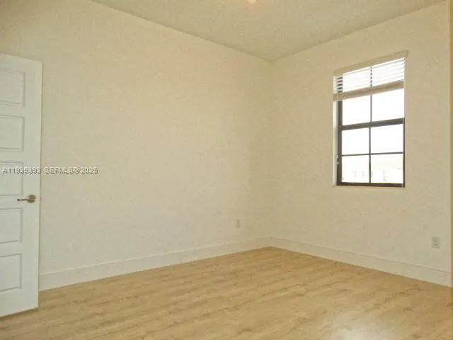 an empty room with cabinet
