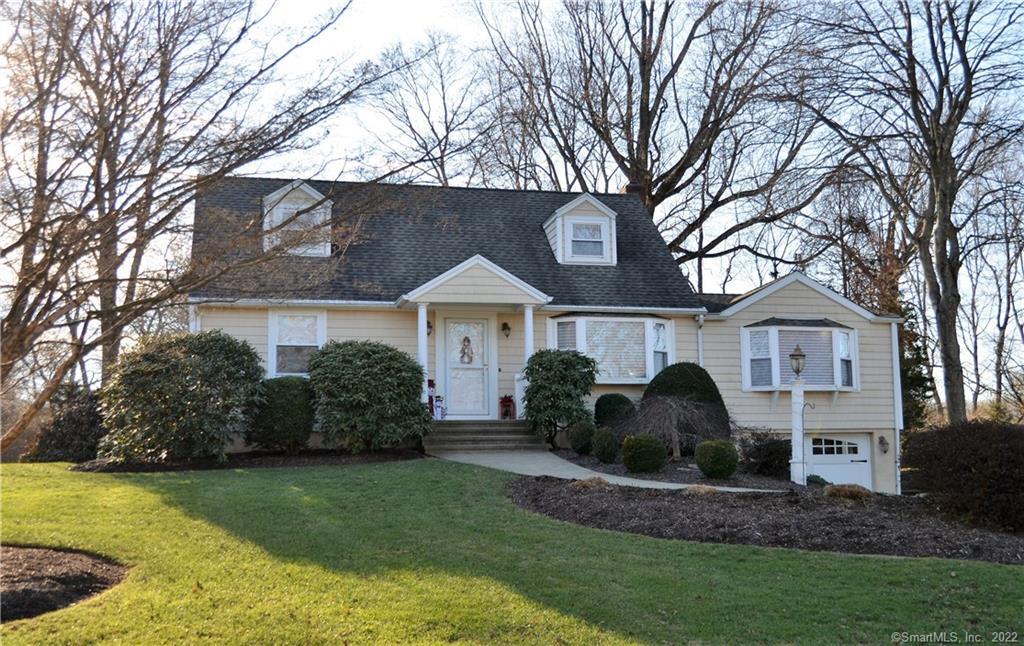 39 Jerome Avenue Trumbull, CT 06611 - Photo 1 of 1 a front view of a house with garden