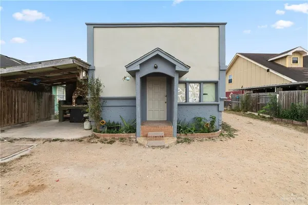 a house view with a outdoor space