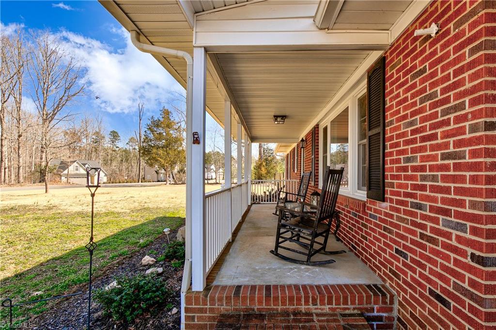 2615 Stutts Road Asheboro, NC 27205 - Photo 6 of 43 Lovely Rocking chair front porch!