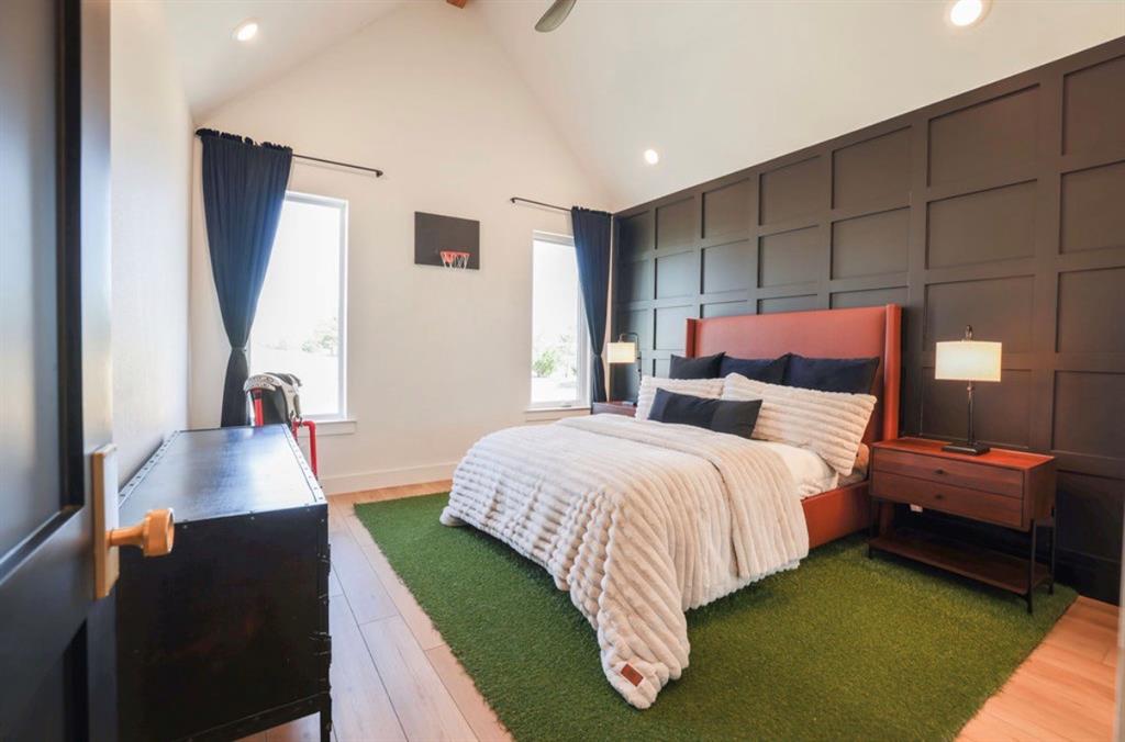 6724 Clearwater Ranch Road Wills Point, TX 75169 - Photo 22 of 38 a bedroom with a bed and a mirror