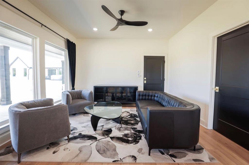 6724 Clearwater Ranch Road Wills Point, TX 75169 - Photo 28 of 38 a living room with furniture and a window