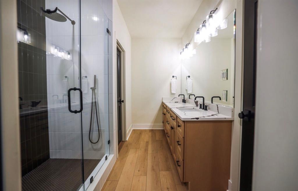 6724 Clearwater Ranch Road Wills Point, TX 75169 - Photo 32 of 38 a bathroom with a sink vanity and shower