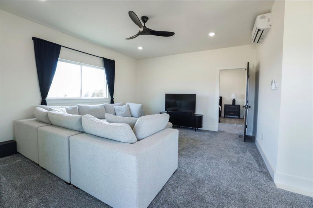 6724 Clearwater Ranch Road Wills Point, TX 75169 - Photo 34 of 38 a living room with furniture and a window