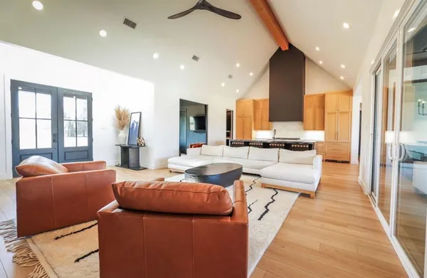 a kitchen with stainless steel appliances granite countertop a stove and a refrigerator