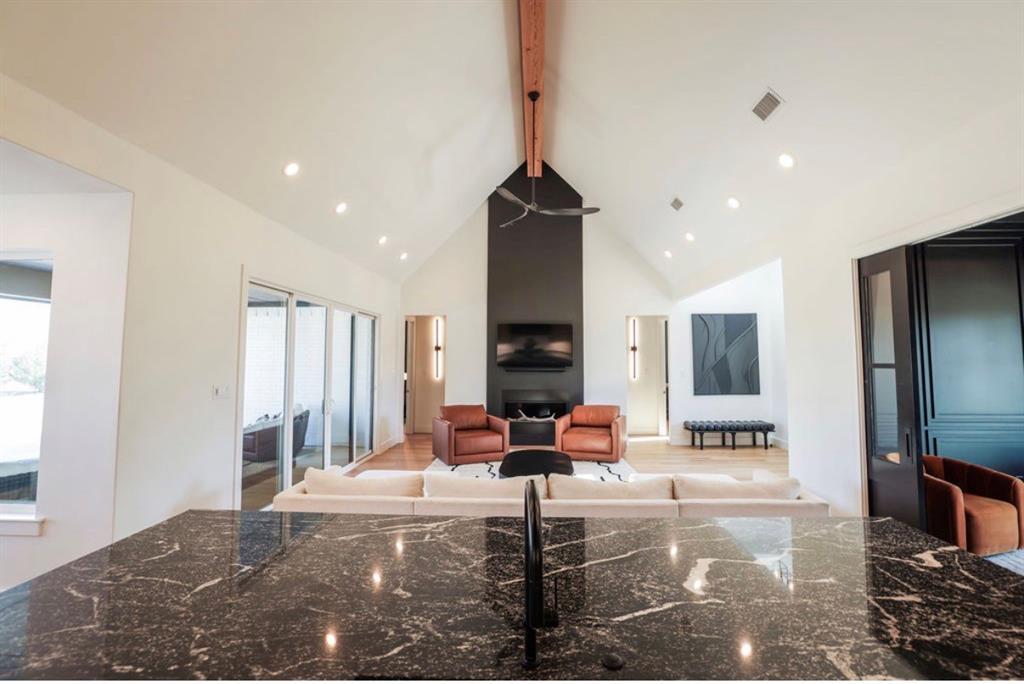 6724 Clearwater Ranch Road Wills Point, TX 75169 - Photo 8 of 38 a living room with fireplace furniture and a flat screen tv